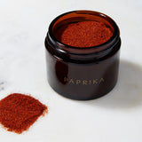 paprika spice jar with spice on side