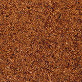 Close-up image of Evermill's Organic Nutmeg Refill, showcasing a granular, brown substance. The texture appears coarse and gritty, with small, uneven particles uniformly spread across the surface.
